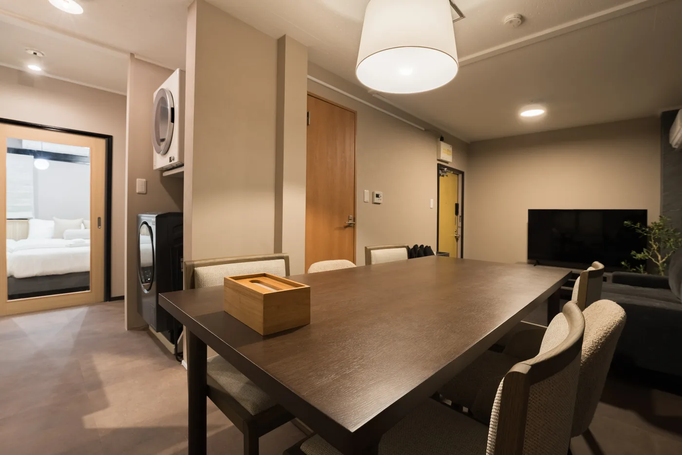 The dining table and open living space of HIKAWA HOUSE 101